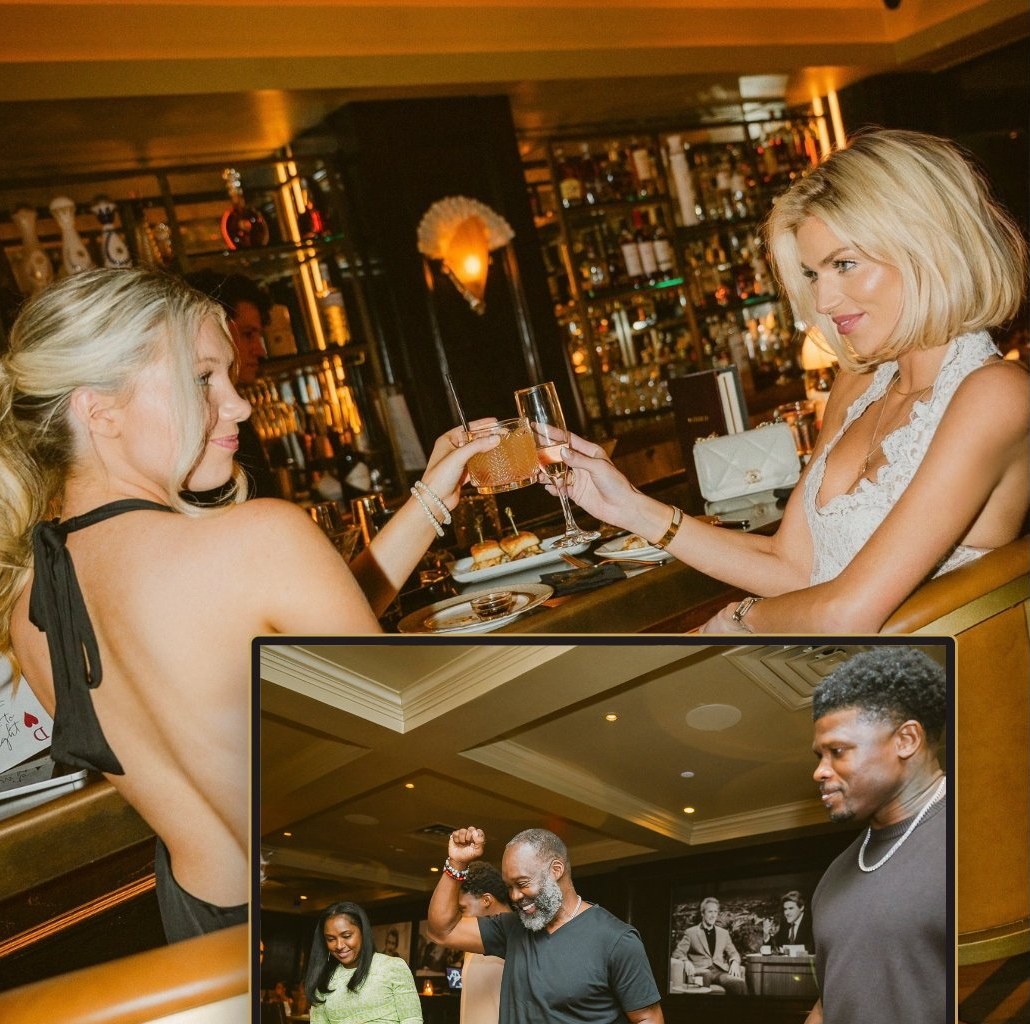 Two women toasting at the Maître D bar